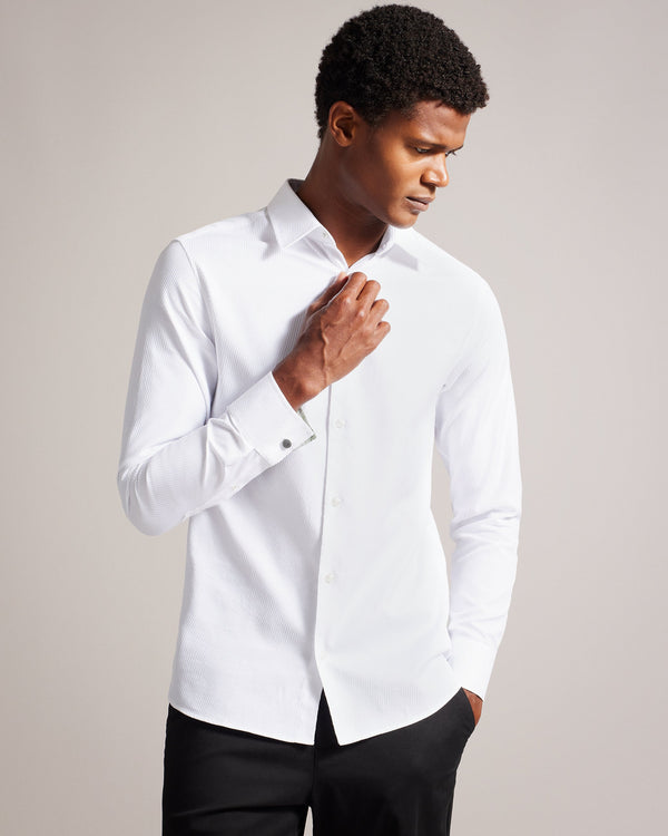 LECCE-Shirts-LECCE is the epitome of elevated fashion. Subtle detailing in the form of textured stripes makes this shirt an easy go-to for business meetings and special occasions alike. Button up shirt Pure cotton Textured stripes Long sleeves Classic collar O'Shea is 6'2.5" / 1.89m and wears White in a Ted size 3- Ted Baker Romania